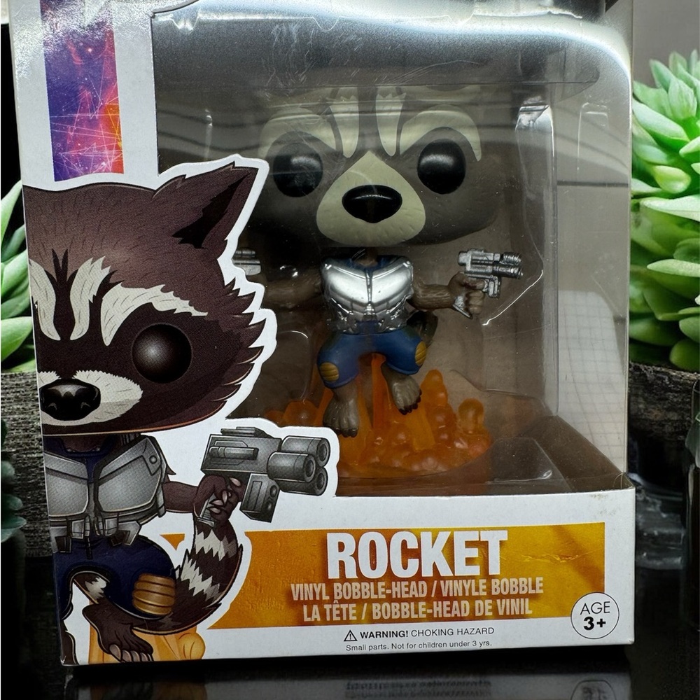 Funko Gray and White Action Figure Rocket
